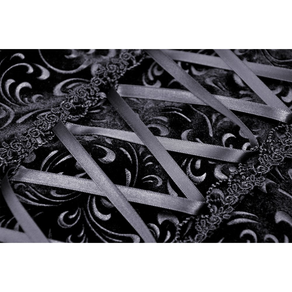 Close-up of the luxurious velvet fabric of Dark In Love midi skirt showcasing exquisite lace hemline details.