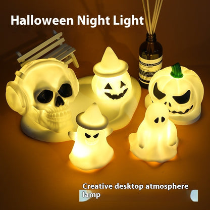 Halloween LED Glowing Cute Small Night Lamp featuring charming designs of pumpkins and ghosts, ideal for creating an enchanting atmosphere during Halloween festivities.