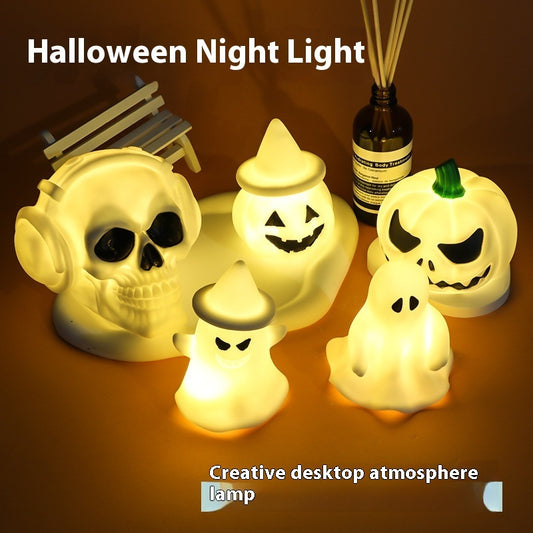 Halloween LED Glowing Cute Small Night Lamp featuring charming designs of pumpkins and ghosts, ideal for creating an enchanting atmosphere during Halloween festivities.
