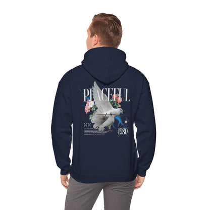 Premium back view of a navy blue hoodie adorned with an artistic dove and floral graphic, showcasing the word 'PEACEFUL' in a luxurious design.