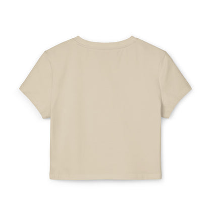 Elegant back view of a cropped women's Baby T-shirt in a neutral hue, showcasing a chic and minimalist design perfect for fashionable layering.