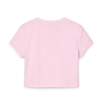 Back view of a fashionable pink cropped t-shirt featuring the slogan 'Live Fast Eat Ass', designed for elegance and comfort.