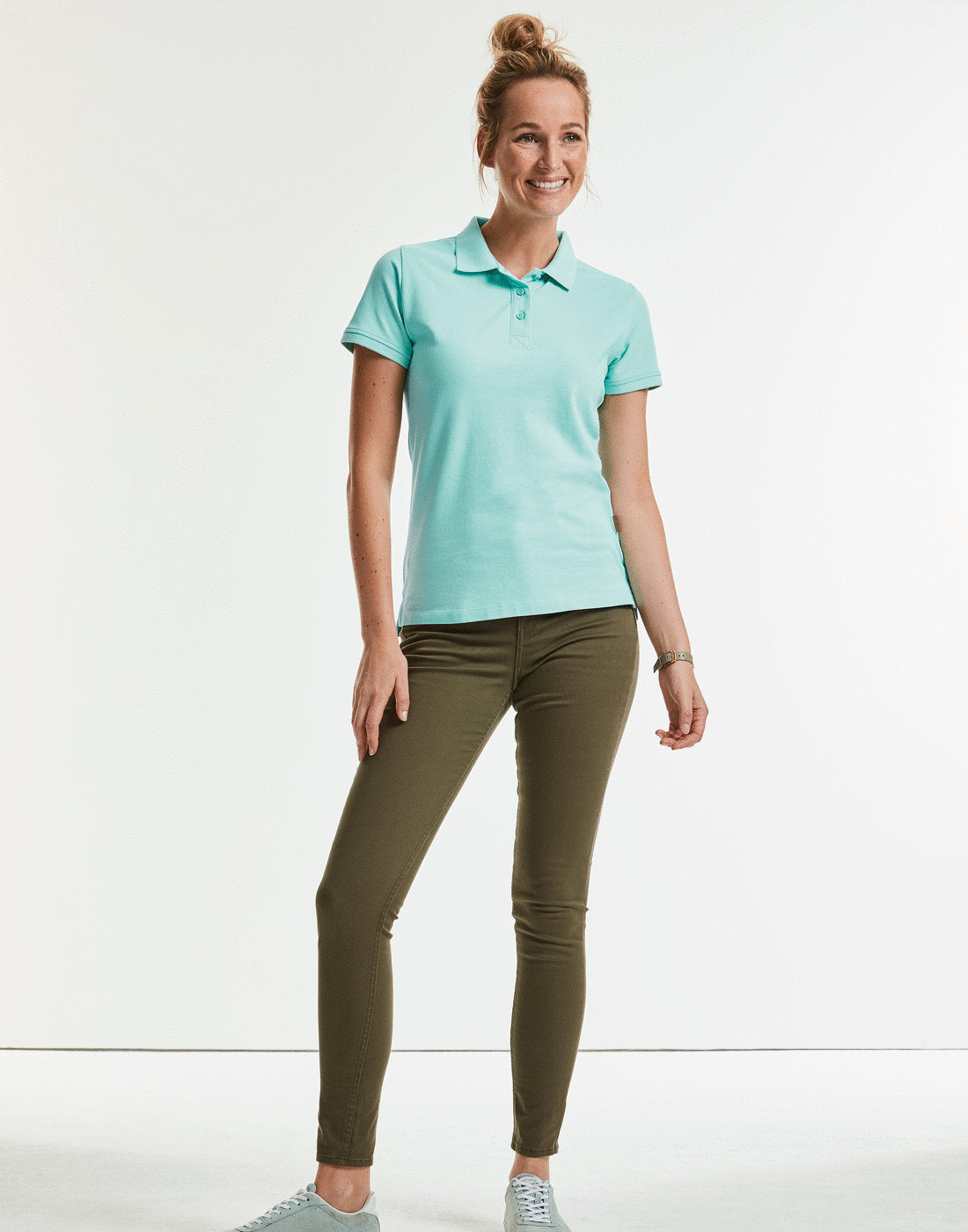 Luxury sustainable organic cotton polo shirt for ladies, showcasing contemporary fit and modern design.