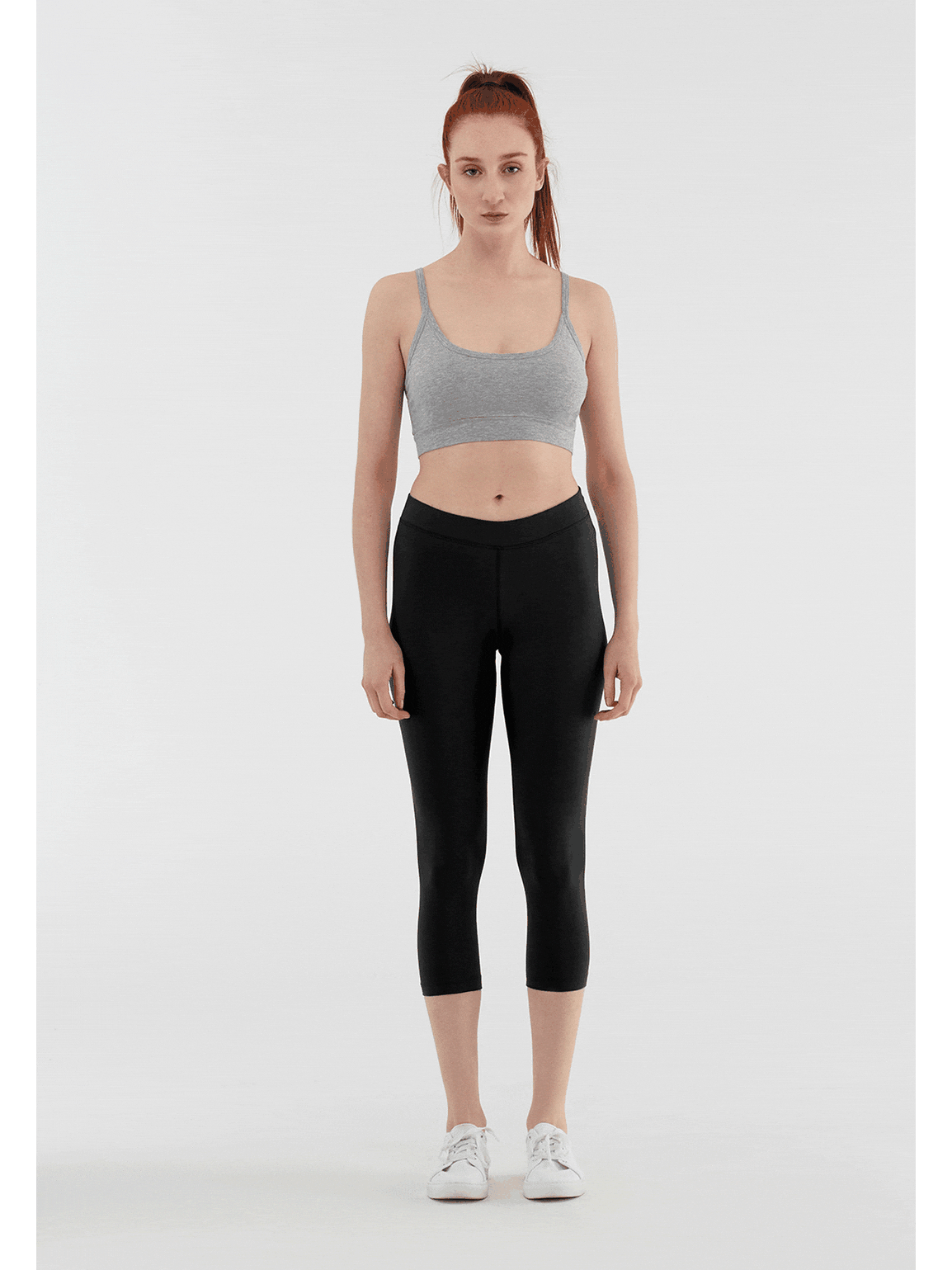 Model wearing Luxury Organic Stretch 7/8 Leggings, demonstrating a perfect fit and elegant silhouette.