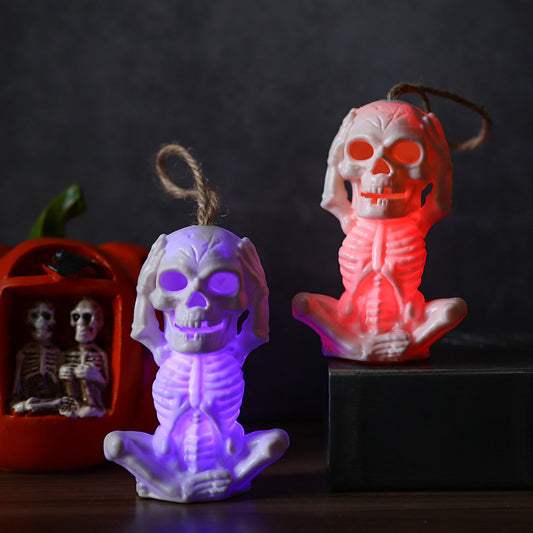 Halloween Skull Light LED Electronic Ghost Head Light featuring a beautifully crafted white skeleton with radiant colours, perfect for upscale Halloween decorations.