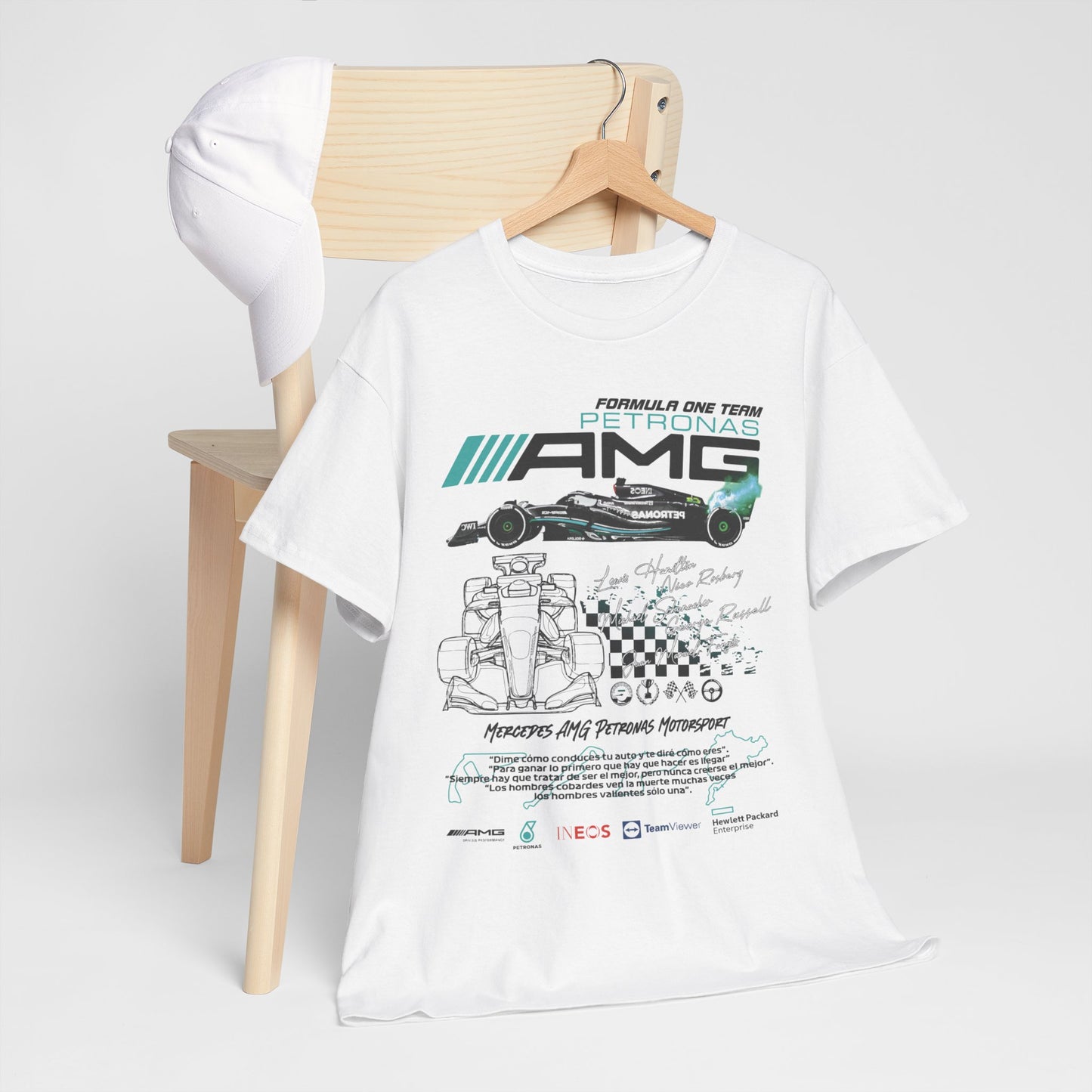 Chic white F1 Petronas AMG t-shirt artfully draped on a wooden chair, highlighting iconic racing graphics and the spirit of speed.