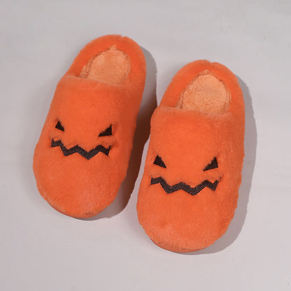 Cute Halloween Pumpkin Slippers Winter Warm Plush Bedroom Floor Home Slippers Casual Slip On Comfortable Cozy Indoor House Shoes showcasing a bright orange colour with playful pumpkin detailing.