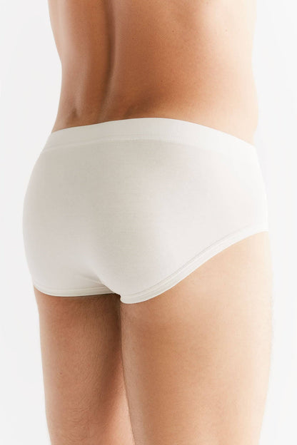 Flat lay of Earth Wardrobe luxury organic cotton briefs, highlighting elegant design and sustainable materials for men.