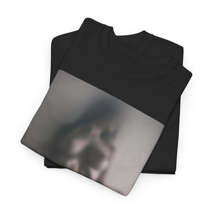 Elegant black t-shirt showcasing a soft-focus art print of a nude figure, embodying contemporary style and artistic flair.