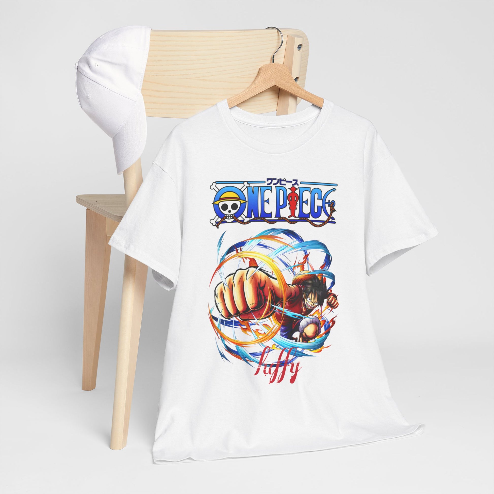 Stylish men's t-shirt with an attention-grabbing One Piece design, displayed alongside a chic cap, perfect for a fashionable and adventurous look.