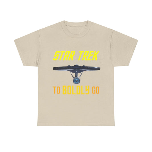 Luxury unisex Star Trek graphic T-shirt showcasing the USS Enterprise with 'TO BOLDLY GO' in striking yellow and orange text, elegantly displayed on a soft beige fabric.
