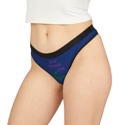 Stylish women's cheeky thong in deep blue with playful text, designed for comfort and allure. Crafted from vegan-friendly materials, showcasing a blend of fun and seduction.