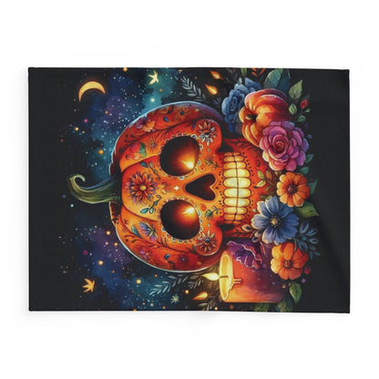 Exquisite view of the Decorative and Warm Halloween Spooky Arctic Fleece Blanket showcasing an artistic skull pumpkin design with vibrant floral elements, ideal for a stylish Halloween décor.