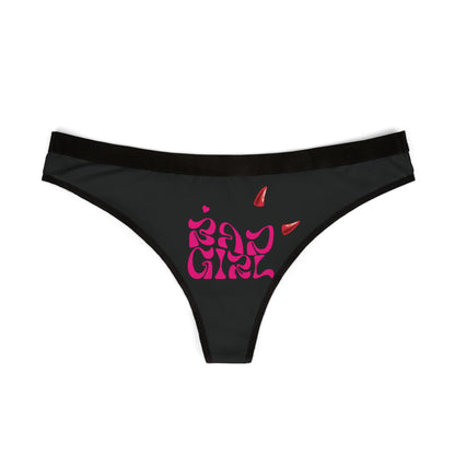 Elegant black thong design showcasing a striking hot pink 'Bad Girl' typography adorned with red devil horns, perfect for adding a naughty touch to your lingerie collection.