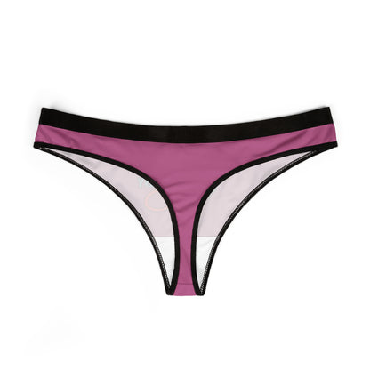 Stylish pink thong with black detailing, displaying a playful 'Owned by Daddy' message, a luxurious addition to any lingerie collection.