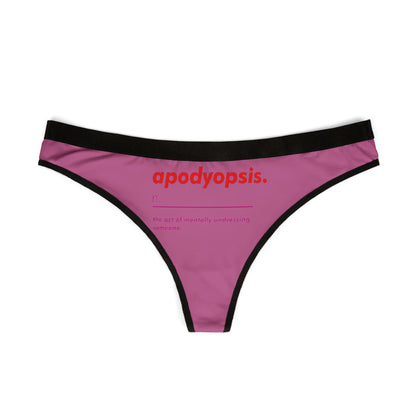 Sleek women's thong displayed flat, showcasing a whimsical pink design with the term 'apodyopsis' printed in bold red, ideal for adding a touch of humour to intimate apparel.