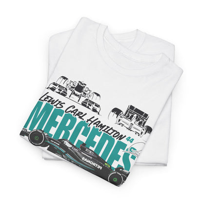 Sophisticated presentation of folded white Mercedes F1 t-shirts featuring Lewis Hamilton's name and stylish graphics, ideal for stylish race day attire.