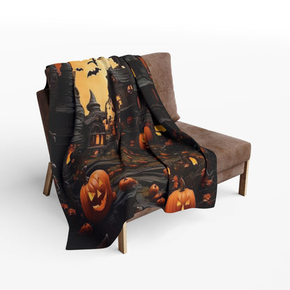 Tastefully arranged Decorative and Warm Halloween Spooky Arctic Fleece Blanket on a modern chair, featuring a captivating scene of a spooky Halloween landscape and vibrant pumpkins.