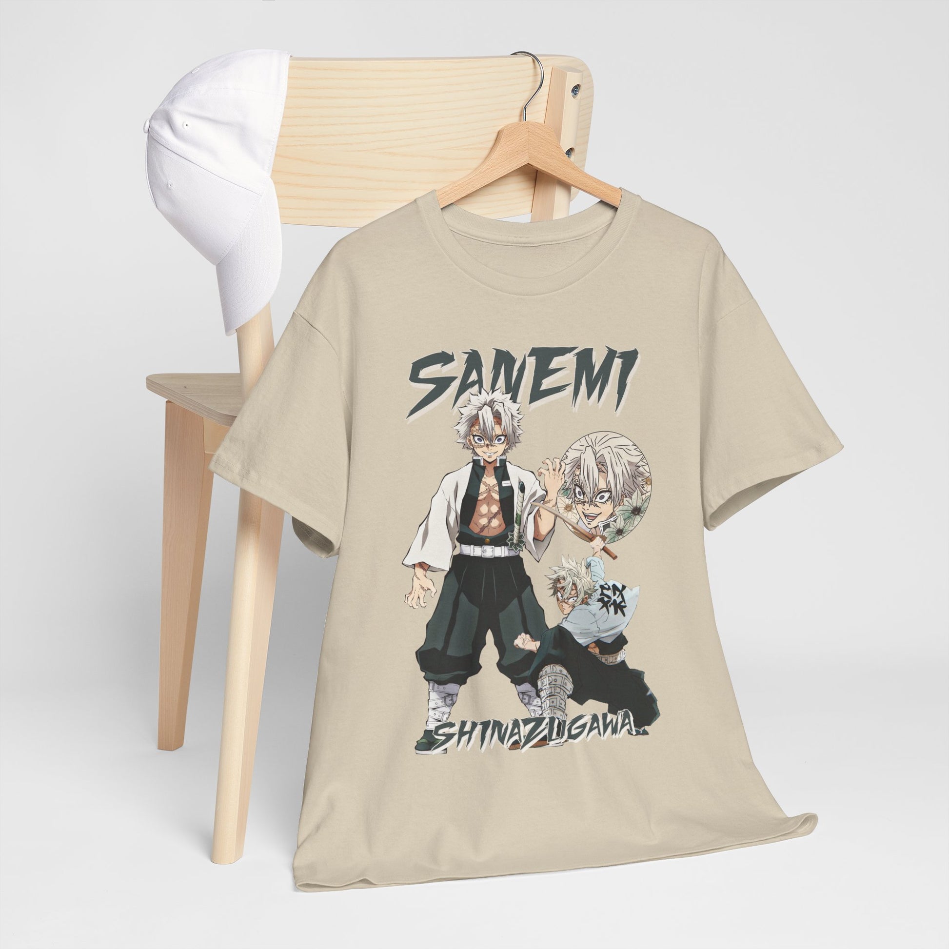 Sophisticated Sanemi Shinazugawa T-shirt showcased alongside a stylish cap on an elegant chair, highlighting its unique anime-inspired design for modern streetwear enthusiasts.