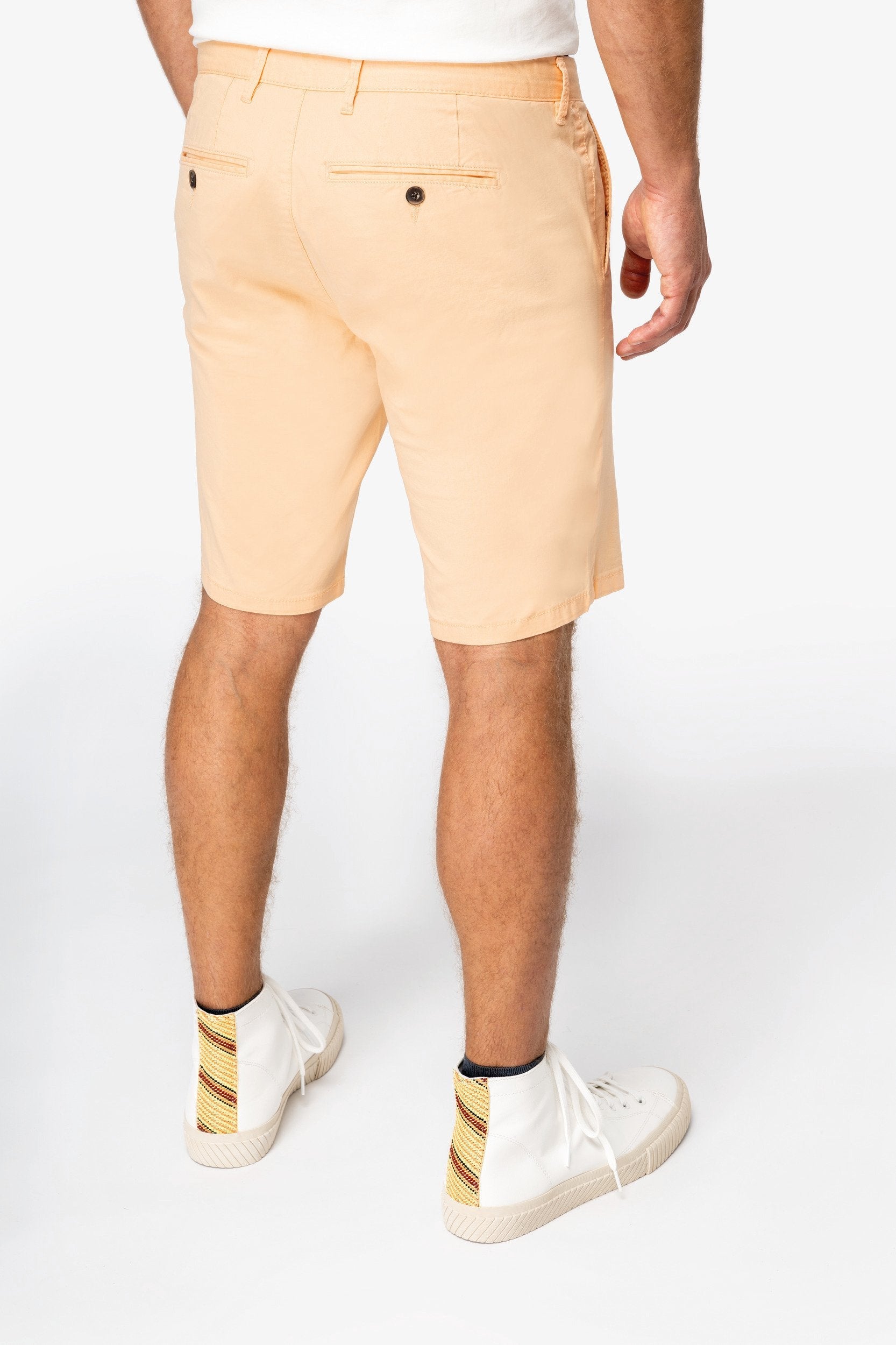 Luxury organic cotton chino shorts for men, featuring a straight-fit design, belt loops, and a soft peach-skin finish, perfect for a polished yet comfortable look in warm weather.