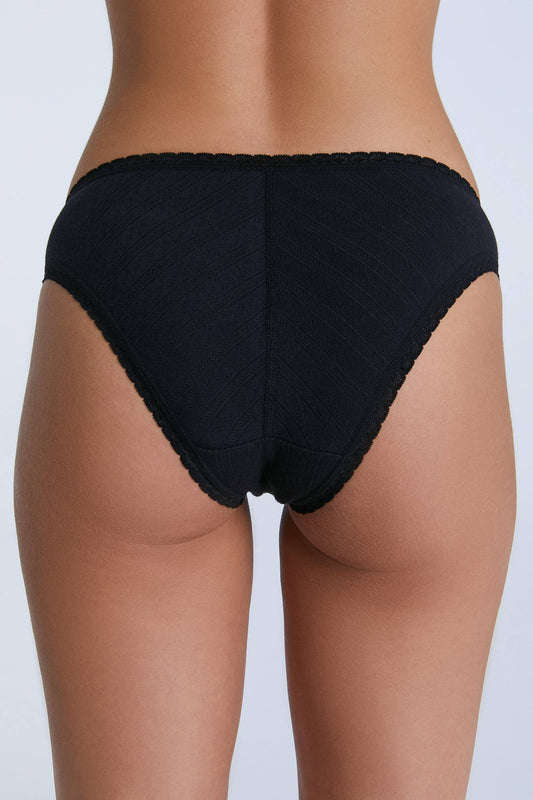 Chic view of the Organic Cotton Slip Dress with Jacquard Lace Trim, highlighting the exquisite craftsmanship and classic silhouette, ideal for sophisticated womenswear.