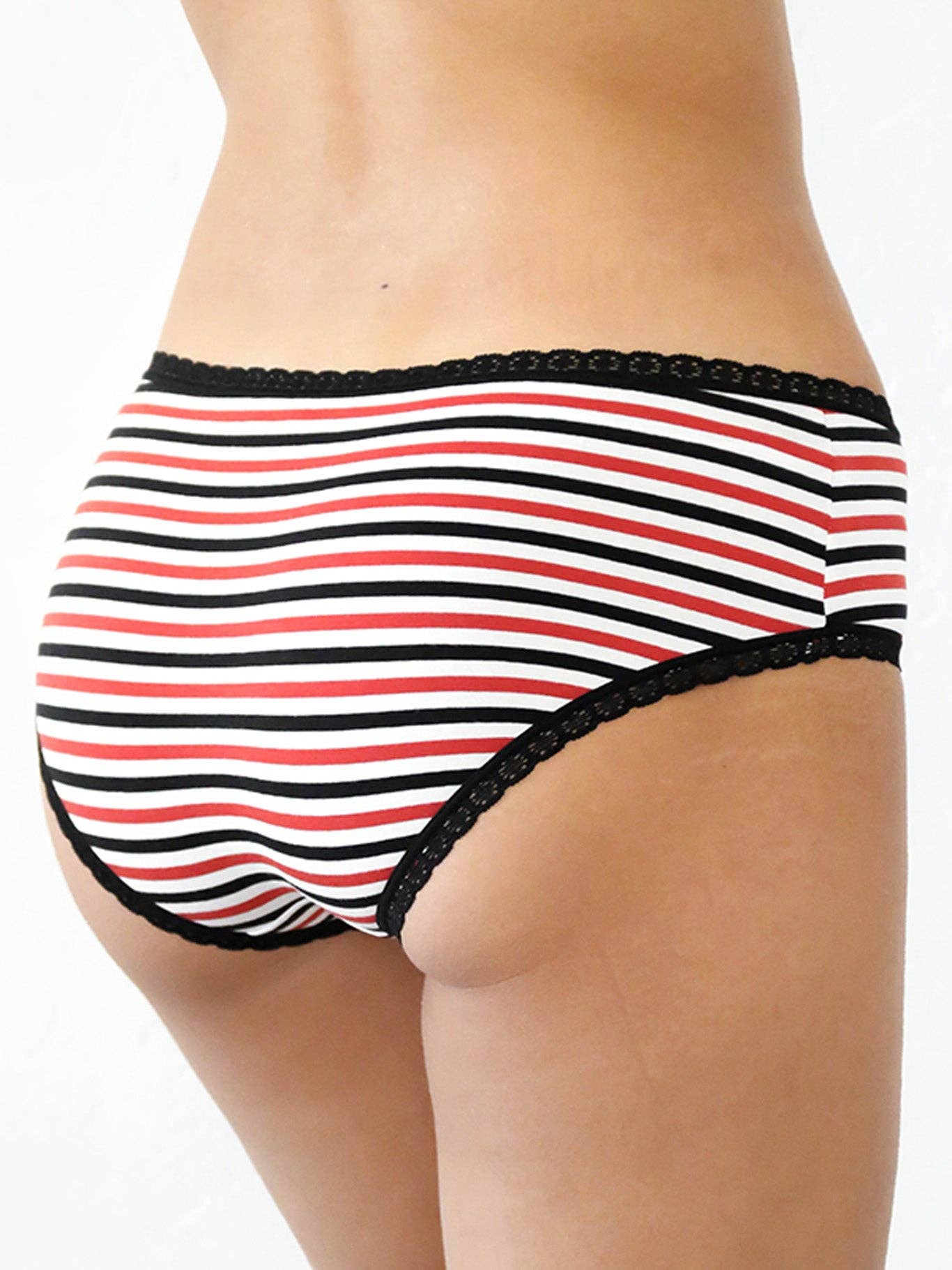 Flat lay of luxury organic cotton hipster briefs with lace trim on a soft fabric background, emphasising organic materials and elegance.