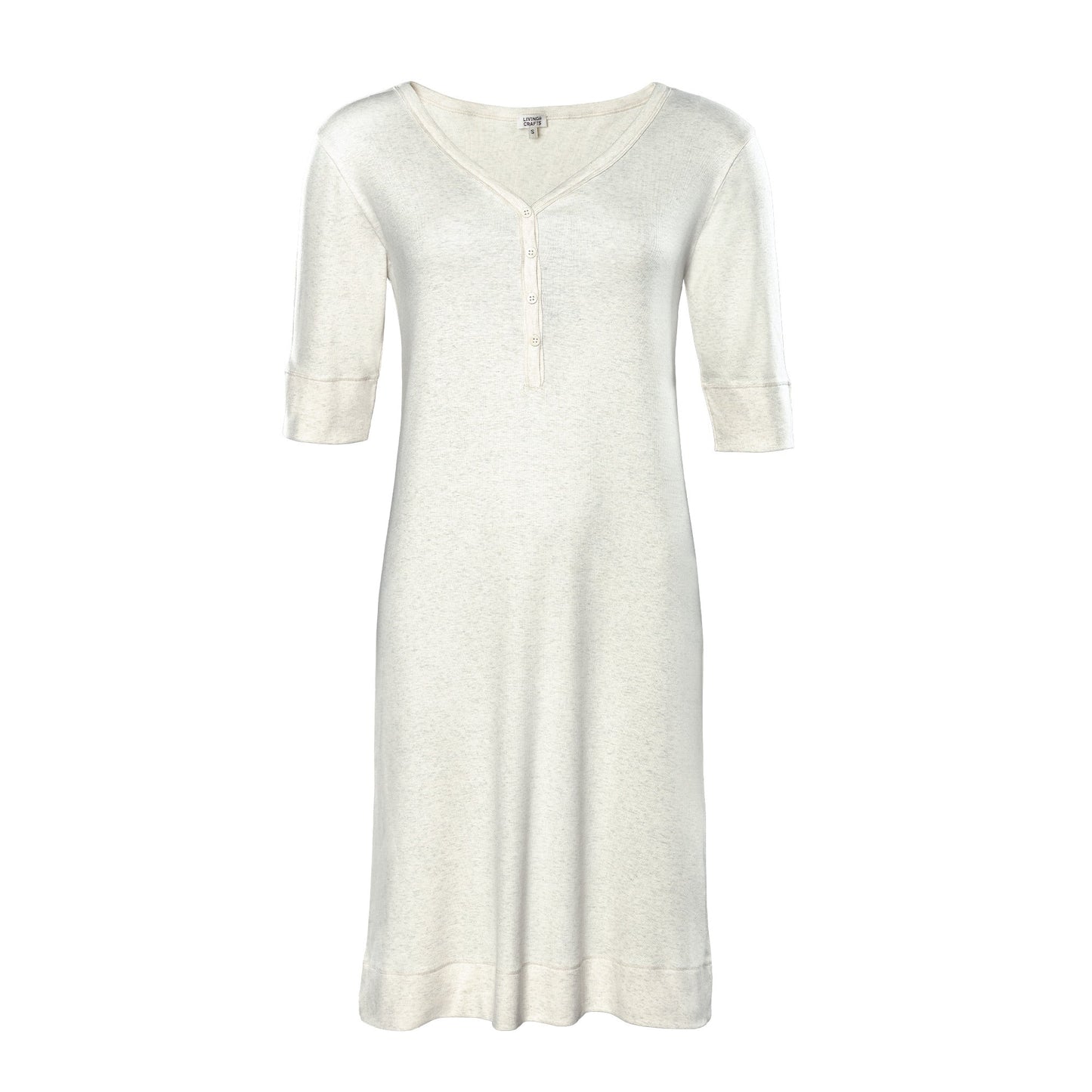 Close-up of luxurious fine ribbed fabric on women's organic cotton night shirt, showcasing softness and warmth.