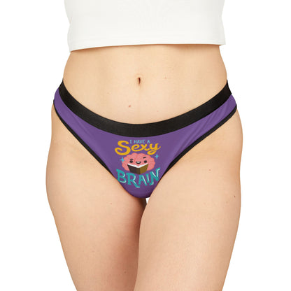 Chic women's thong in purple fabric featuring a playful graphic design with the caption 'I have a sexy brain'. The stylish underwear, part of a cheeky Valentine's gift collection, showcases humour and charm, perfect for romantic occasions.