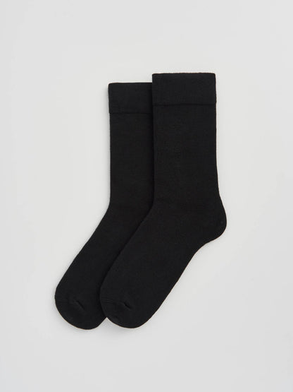 Luxury bamboo calf-length socks featuring a super soft and breathable texture for ultimate comfort.