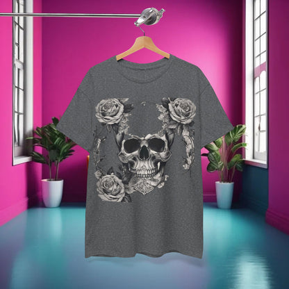Skulls and Roses Cotton Tee displayed in a stylish pink room, showcasing the front design of a striking skull and roses graphic, exemplifying edgy yet sophisticated style.