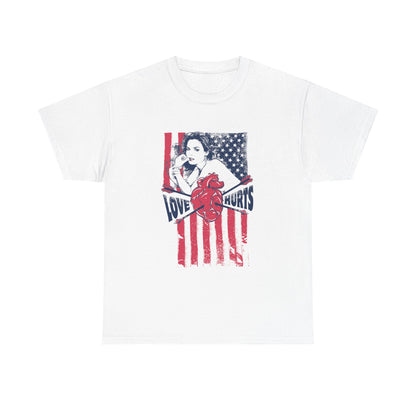 Stylish white men's t-shirt featuring a vintage pin-up girl design against a distressed American flag, with bold typography stating 'LOVE HURTS' and a striking red heart graphic, embodying a blend of nostalgia and modern artistry.