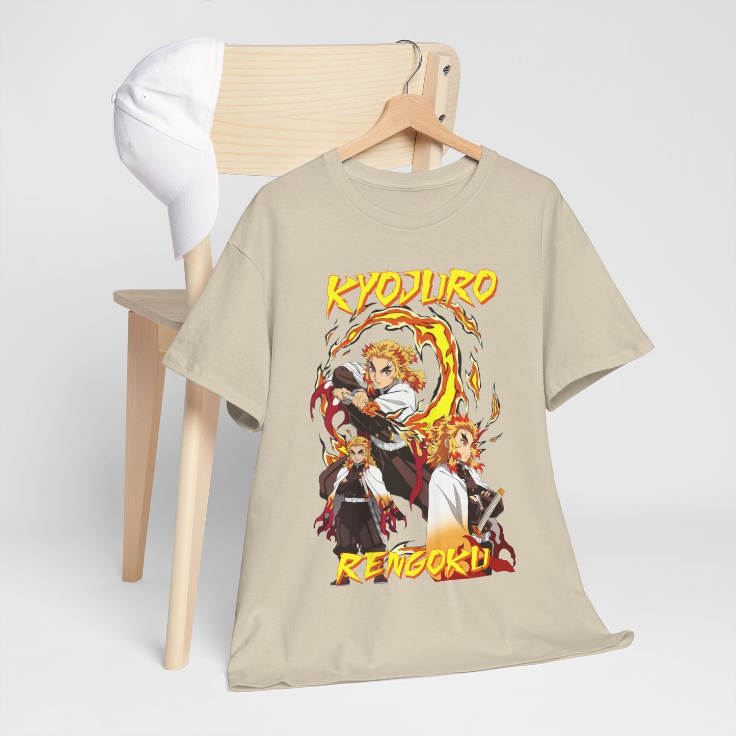 Kyojuro Rengoku anime t-shirt artistically draped over a chair, complemented by a stylish cap, representing a blend of comfort and unique style for fans of the series.