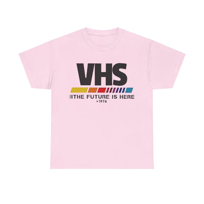 VHS Retro Logo Graphic Tee for Unisex in a delicate pink tone, highlighted by the nostalgic VHS logo, perfect for adding a touch of whimsy to your wardrobe.
