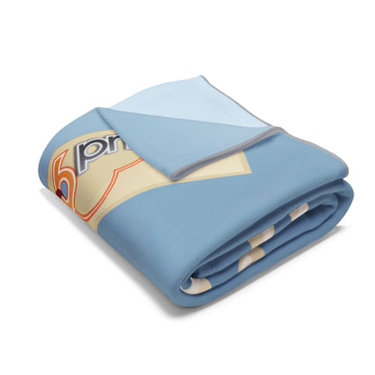 Folded Decorative and Warm Christmas Arctic Fleece Blanket in soft hues, displaying a charming winter motif, perfect for adding a touch of seasonal sophistication to any living space.