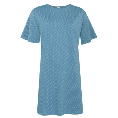 Close-up of the exquisite texture of a luxurious organic cotton midi night shirt for women, emphasising softness and quality craftsmanship.