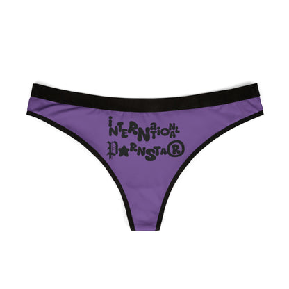 Front view of a chic women's thong with the phrase 'International Star' in bold black typography on a stylish purple background, perfect for fashion-forward lingerie.