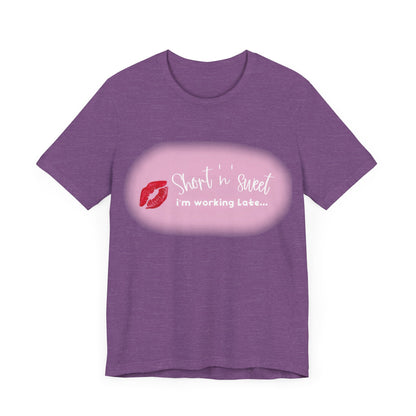 Sabrina Carpenter Inspired Unisex Short Sleeve Tee in a chic purple hue, featuring a striking lipstick print statement, designed for comfort and style.