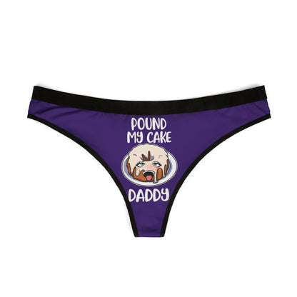 Elegant purple women's thong adorned with a whimsical graphic and the bold phrase 'Pound My Cake Daddy', ideal for a fun and flirty lingerie collection.