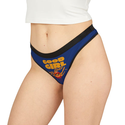 Sophisticated woman showcasing a blue thong panty with the 'Good Girl Gone Bad' design, embodying confidence and sass for an empowered fashion statement.