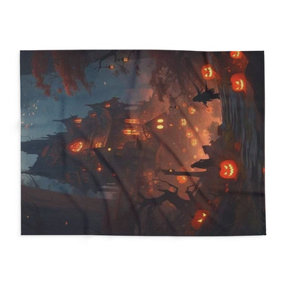 An exquisite view of the Halloween-themed Arctic fleece blanket spread flat, showcasing its captivating design of a spooky landscape adorned with glowing pumpkins.