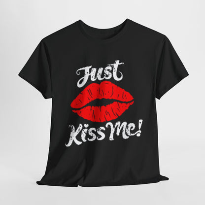 Luxurious black unisex t-shirt featuring a playful ‘Just Kiss Me!’ graphic with bold red lips and stylish typography, ideal for adding flair to casual outings.
