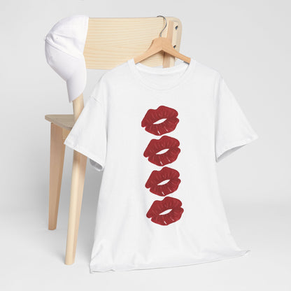 Chic display of a white graphic t-shirt with four red lip designs alongside a trendy baseball cap, embodying a fashionable and fresh Valentine's look.