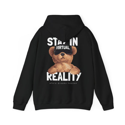 Sophisticated black hoodie showcasing an adorable teddy bear in VR goggles, highlighted by the bold text 'STAY IN VIRTUAL REALITY', ideal for fashion-forward comfort.