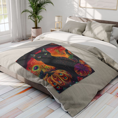 Chic Decorative and Warm Halloween Spooky Arctic Fleece Blanket artistically spread across a stylish bed, featuring captivating designs of a black cat and ornate pumpkins.