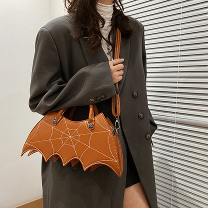 Luxury Halloween Spider Web Shape Shoulder Bag in brown, showcasing its unique batgirl design, perfect for fashionable statement wear during the spooky season.