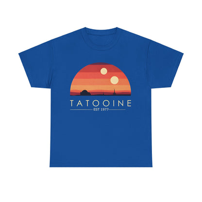 Premium Tatooine Graphic Unisex Tee Shirt in vibrant blue adorned with a captivating sunset scene showcasing two golden suns and desert silhouettes, representing timeless sci-fi artistry since 1977.