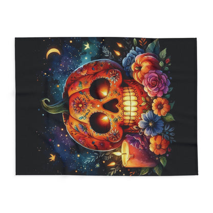Vibrant Decorative and Warm Halloween Spooky Arctic Fleece Blanket displaying an intricate pumpkin skull design with floral accents, rolled neatly for optimal storage showcasing its plush texture.