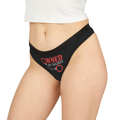 Luxury women's thong featuring a playful and bold graphic with the phrase 'Owned by Daddy' in vibrant red, designed for cheeky and romantic occasions. Perfect blend of allure and humour, adding a touch of fun to intimate wear.