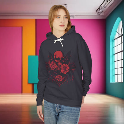 Unisex Lightweight Hooded Sweatshirt in rich navy, adorned with a captivating skull and roses design, displayed by a model in a vibrant interior.
