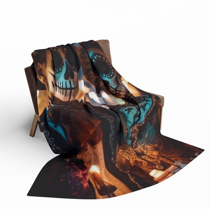 Sumptuous Decorative and Warm Halloween Dia Del Muerte Arctic Fleece Blanket elegantly laid on a couch, adorned with intricate designs celebrating Halloween and Day of the Dead.